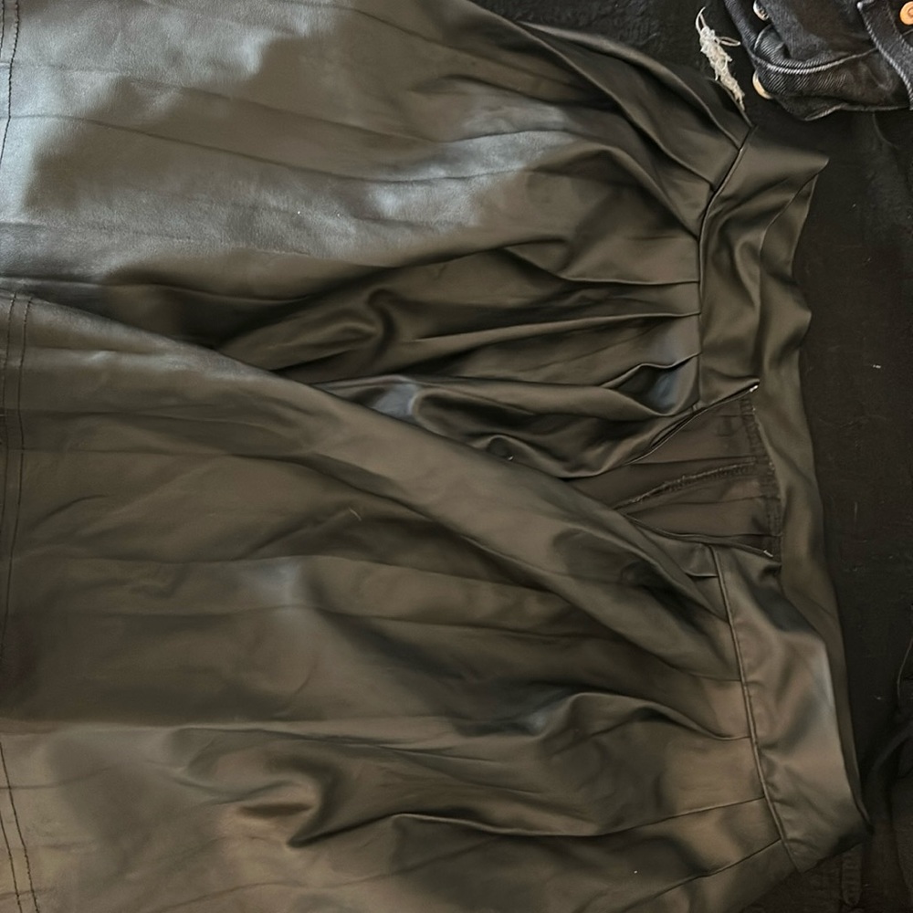 Leather, black skirt